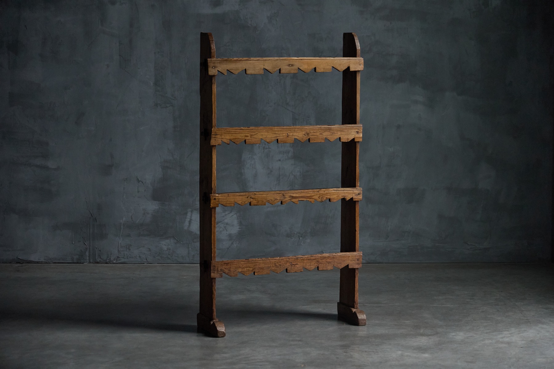 Primitive rustic bookcase from the 19th century in solid wood