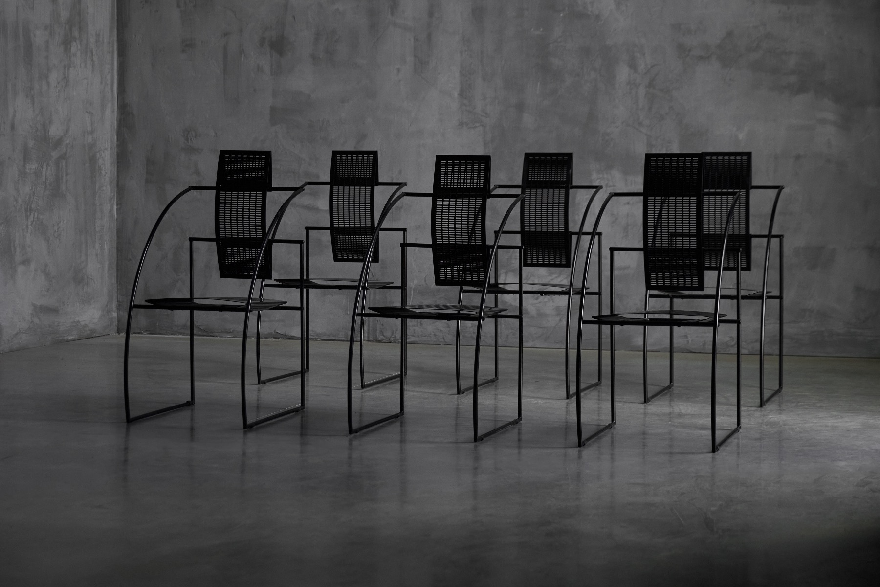 Quinta chairs designed by Mario Botta for Alias in the 1980s