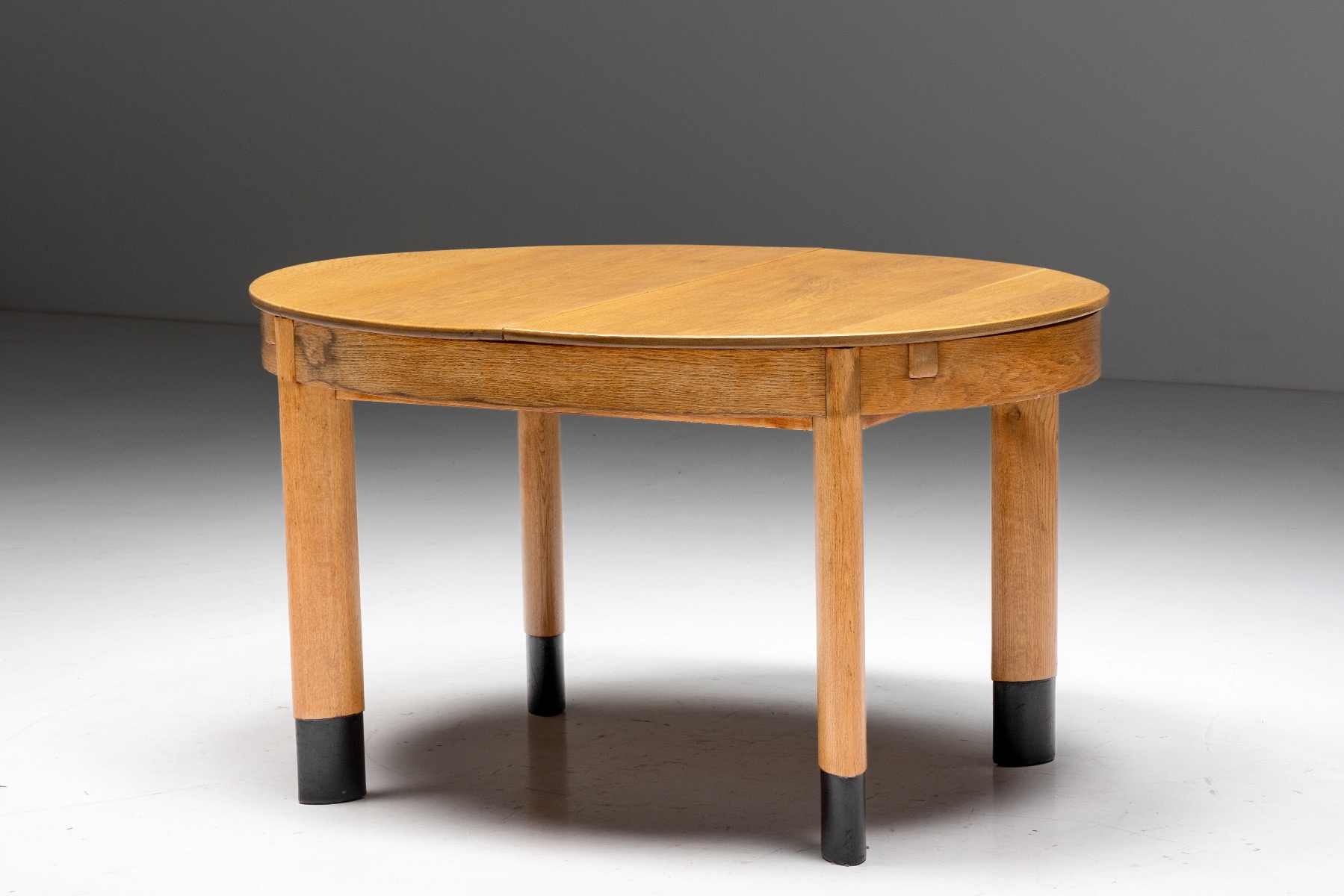 Rationalist oval dining table in oak from Holland from the 1920s