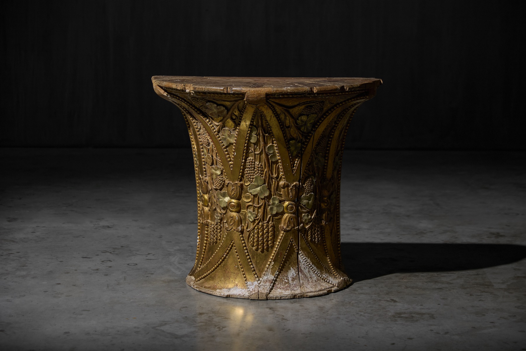 Rococo giltwood demilune console from the 18th century