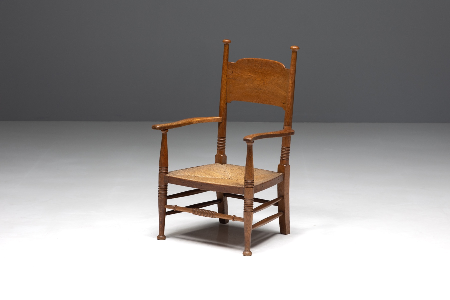 Rustic armchair in solid oak and straw from the 1900s