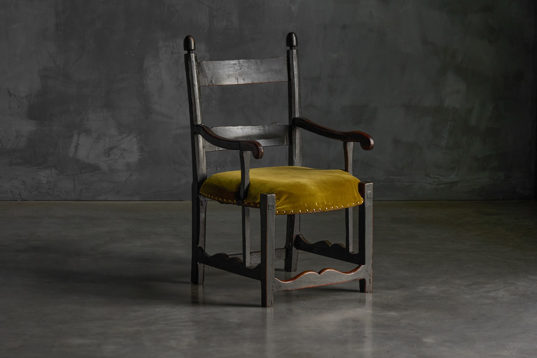 Rustic folk art armchair in solid wood from the 19th century
