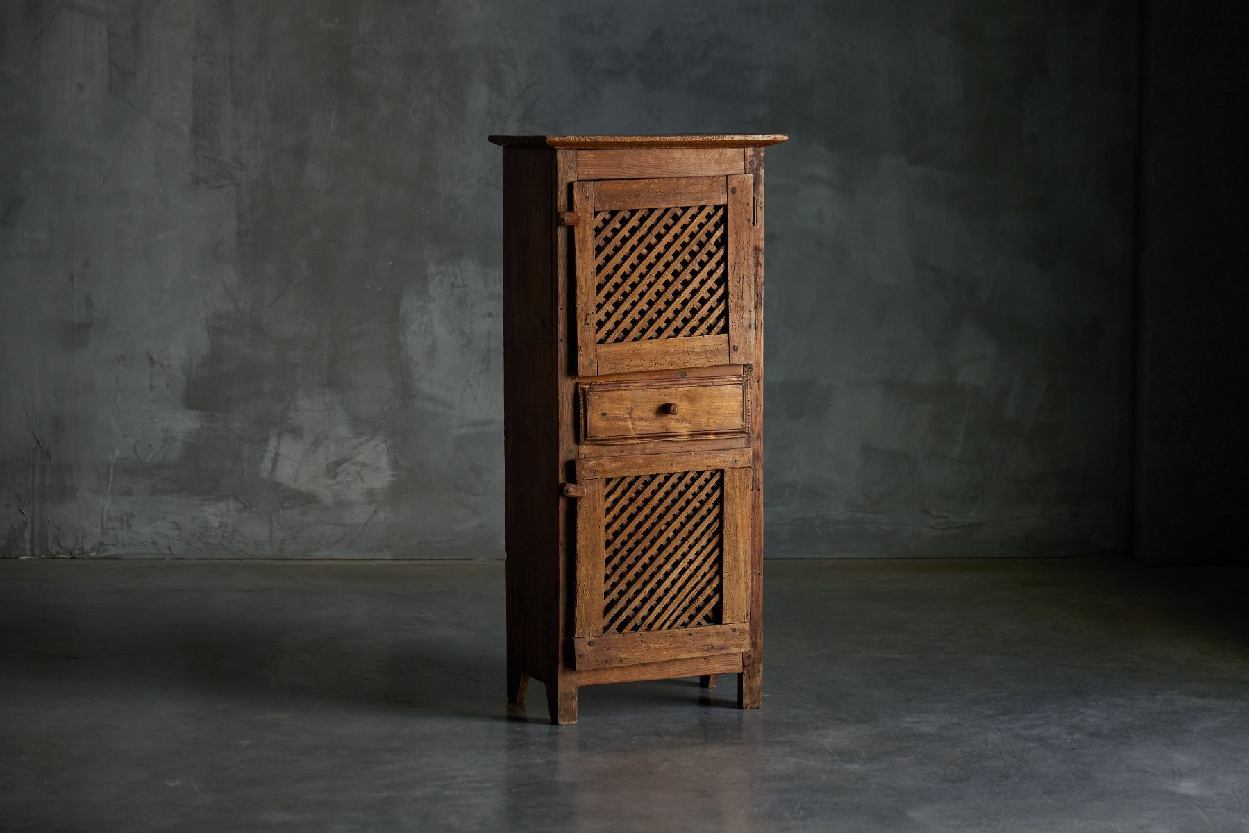 Rustic folk art cabinet from the 19th century