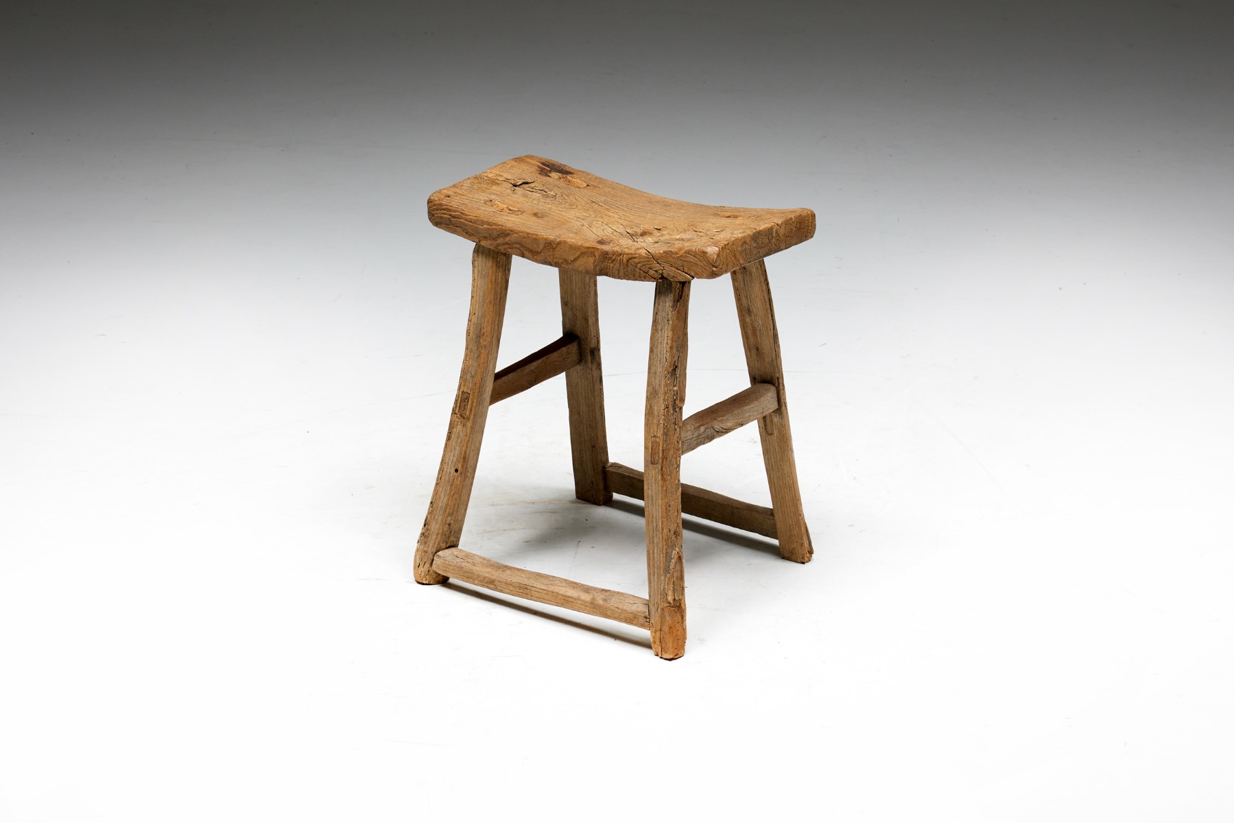 Rustic folk art stool from the early twentieth century