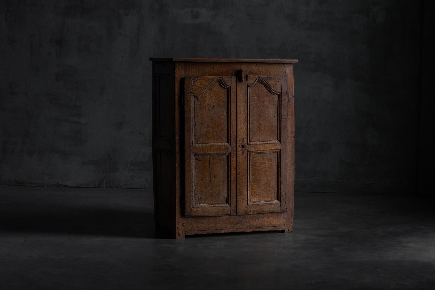 Rustic primitive cabinet from the 19th century