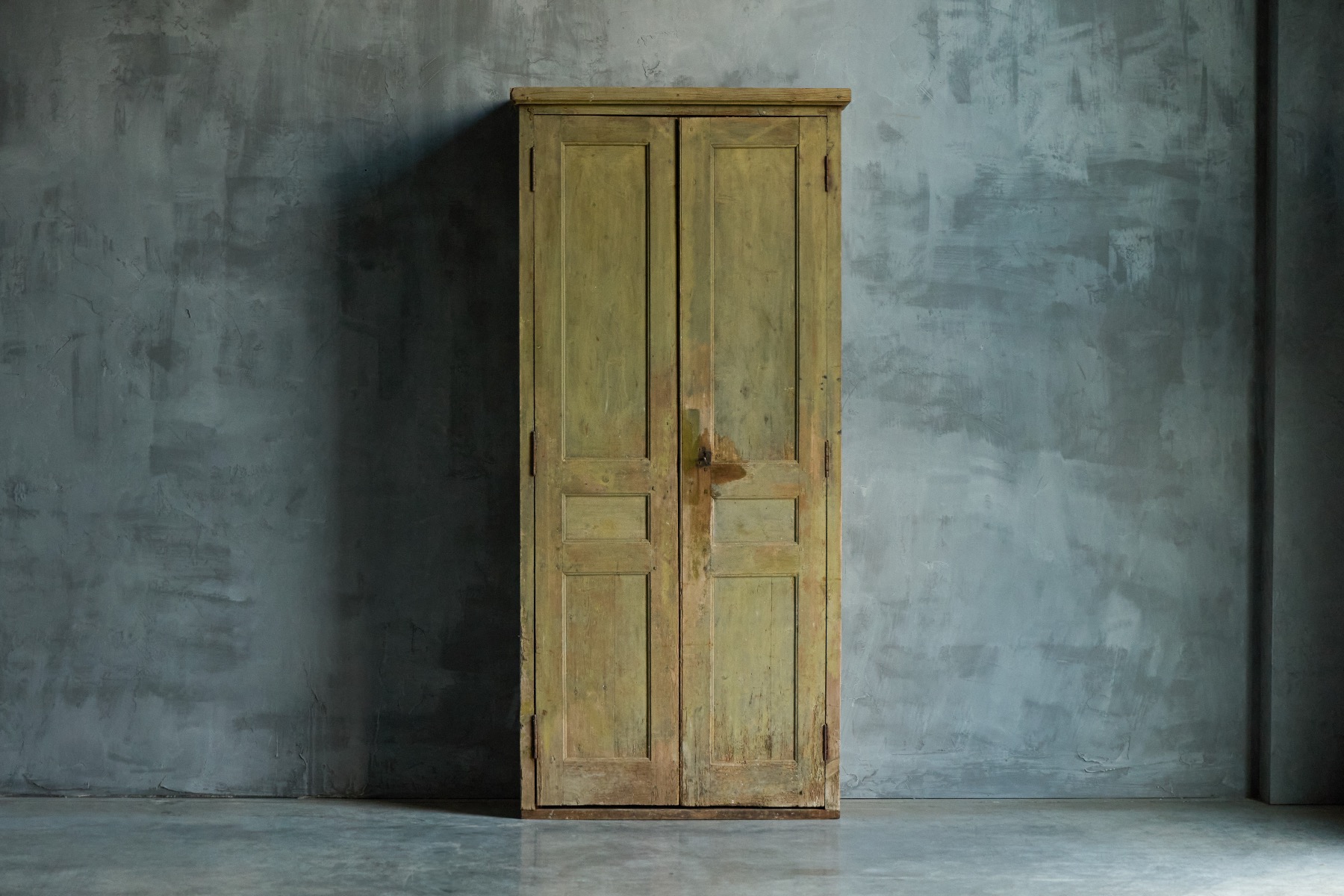 Rustic primitive green cabinet from the 19th century