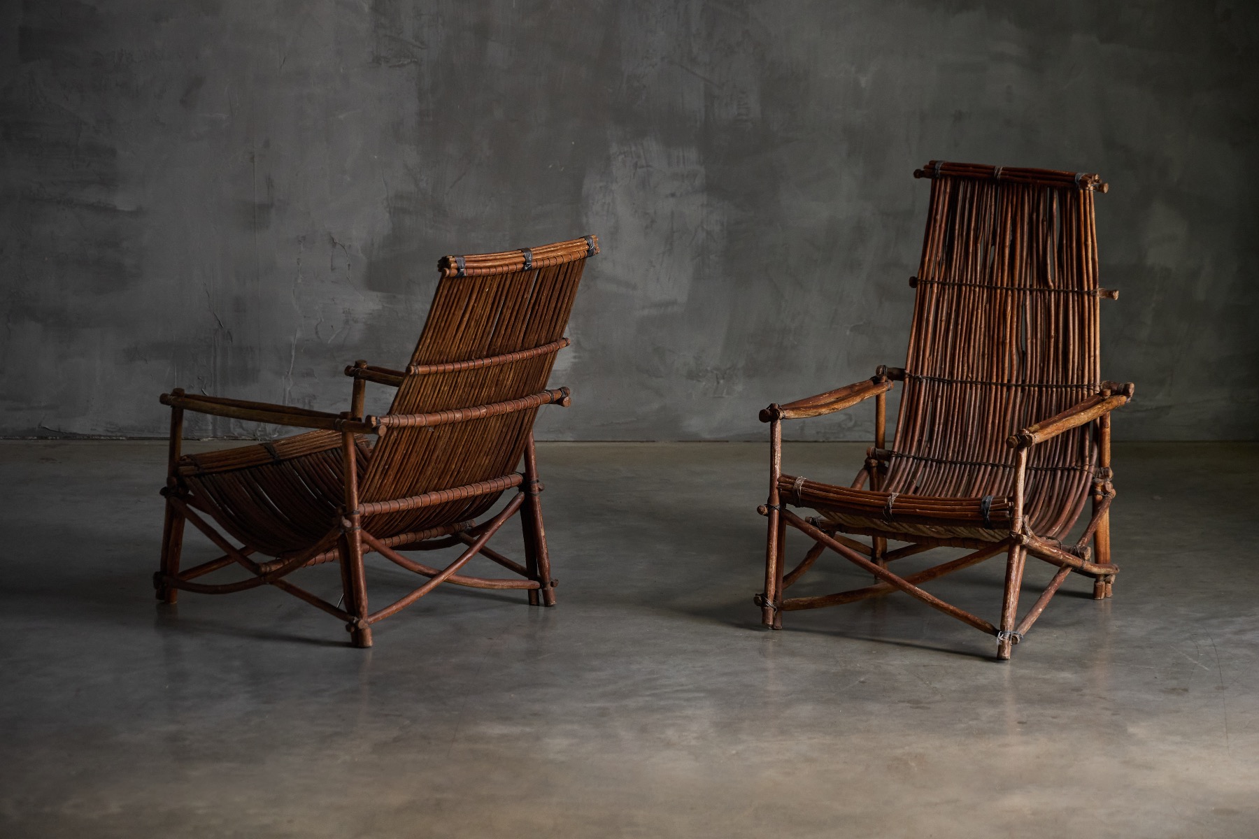 Rustic reclining chairs crafted in wicker from the 1950s