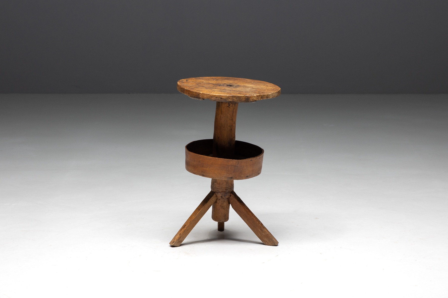 Rustic round tripod side table from the nineteenth century