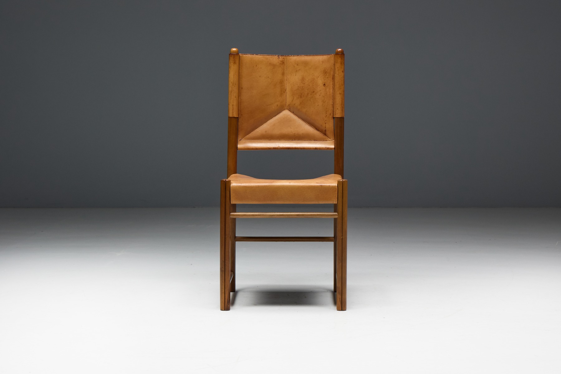 Handcrafted mid century leather dining chairs
