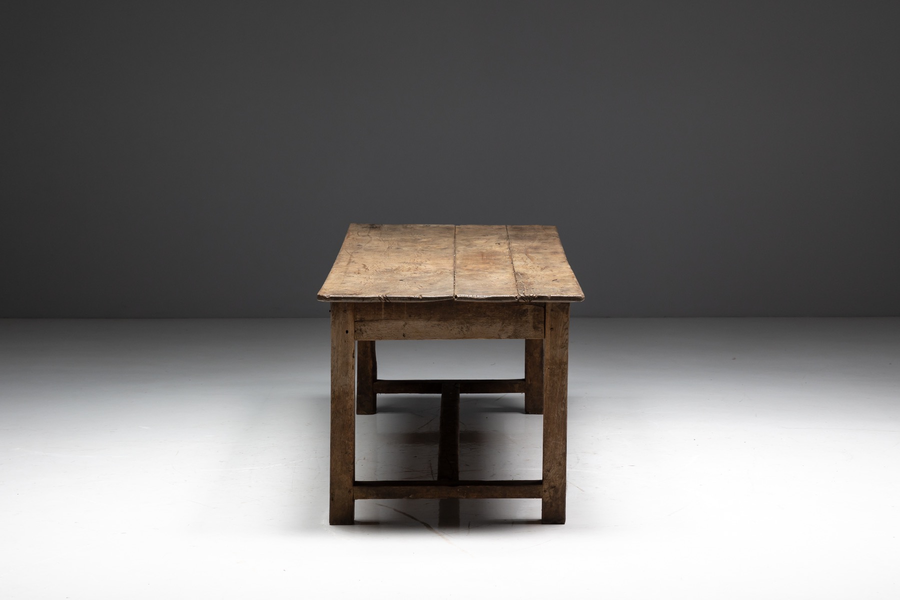 Antique country farmhouse dining table with aged surface