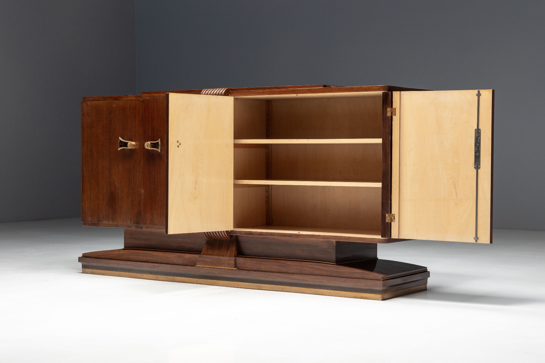 Architectural Art Deco walnut sideboard with sculptural base