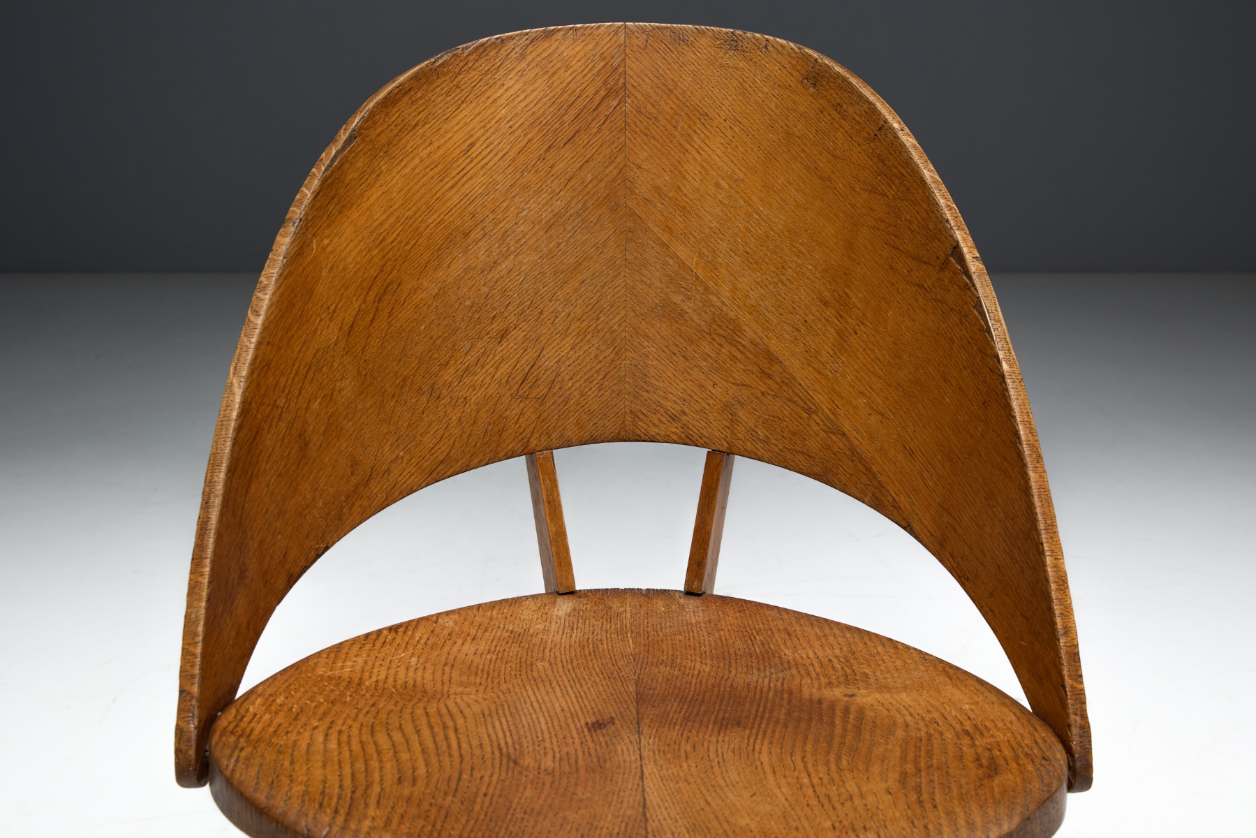 Collectible Italian plywood dining chairs from the 1940s
