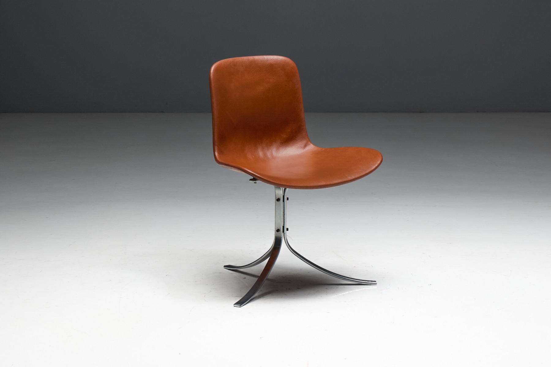 Iconic Danish dining chair designed by Poul Kjærholm