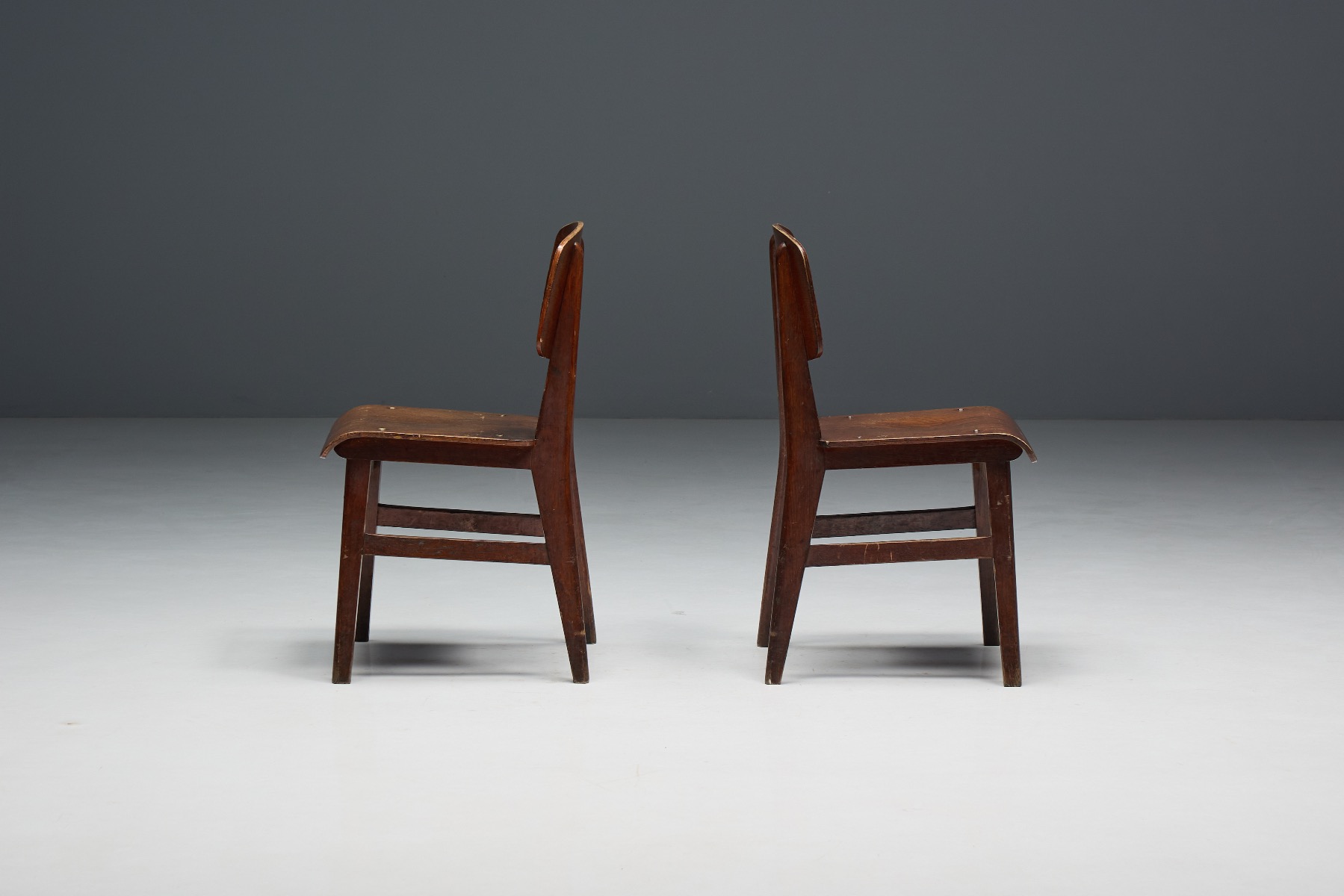Refined wooden chair with structural modernist language
