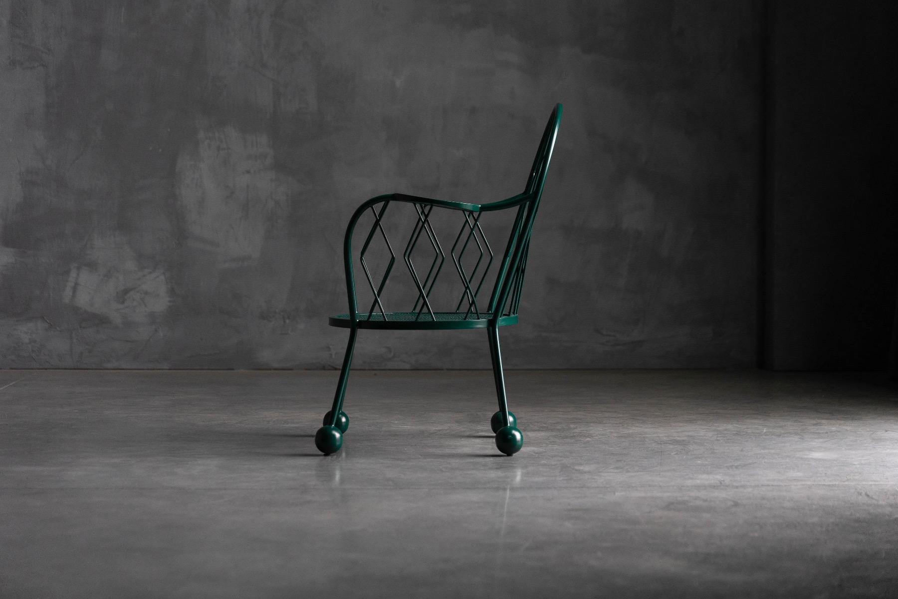 Architectural outdoor armchairs with sculptural form