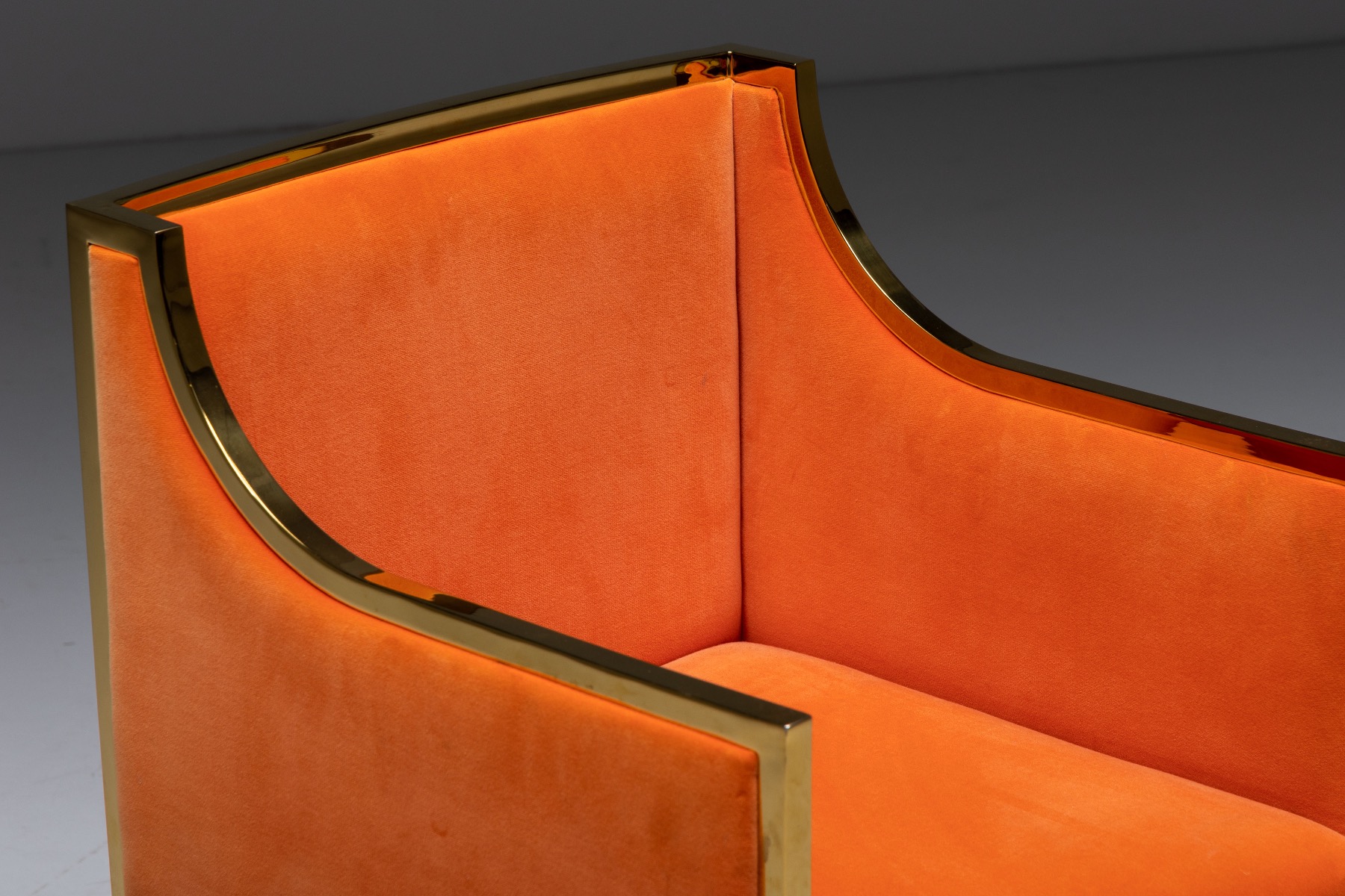 Maison Jansen brass dining armchairs upholstered in orange velvet