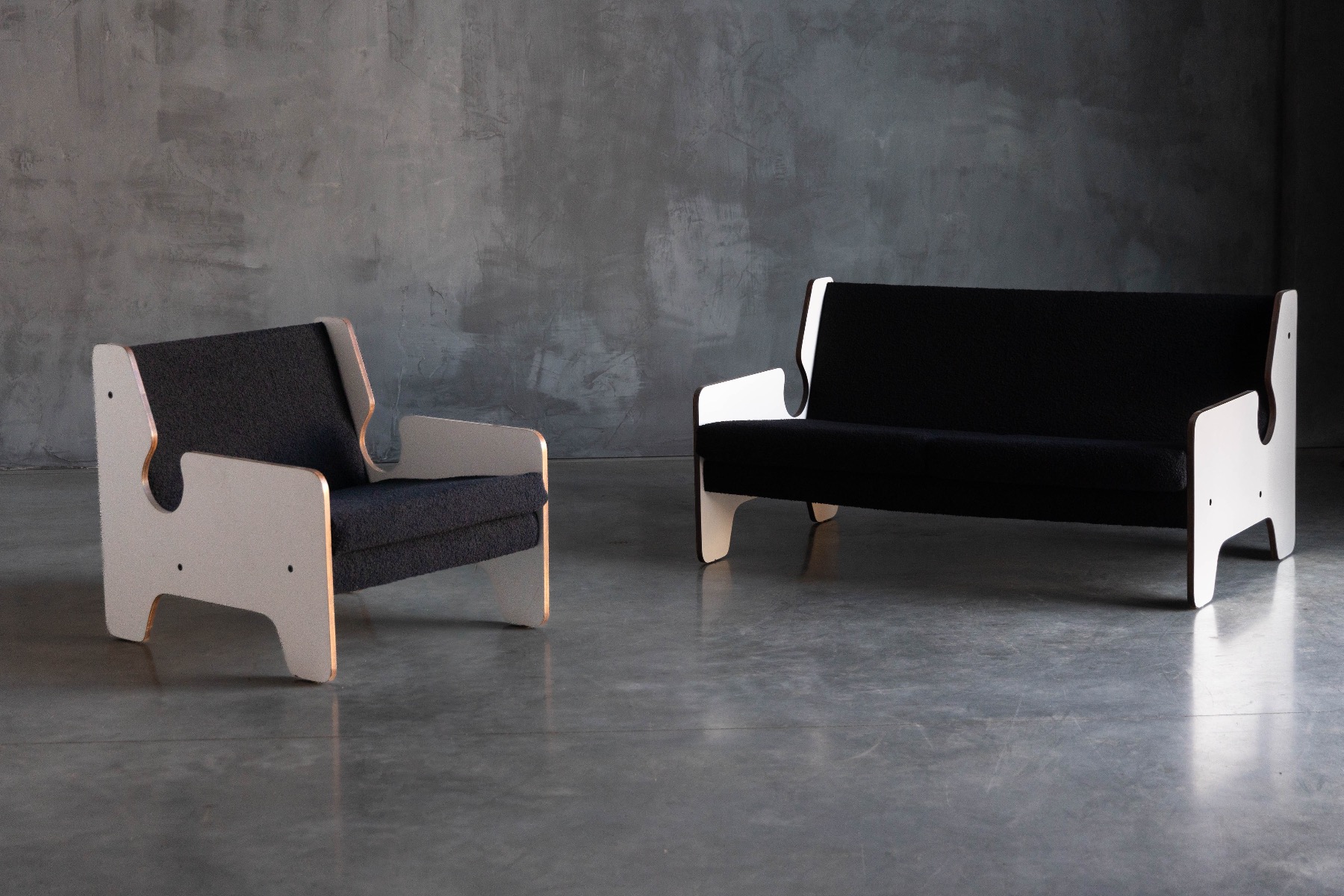 Modernist black and white lounge chair in 1970s look