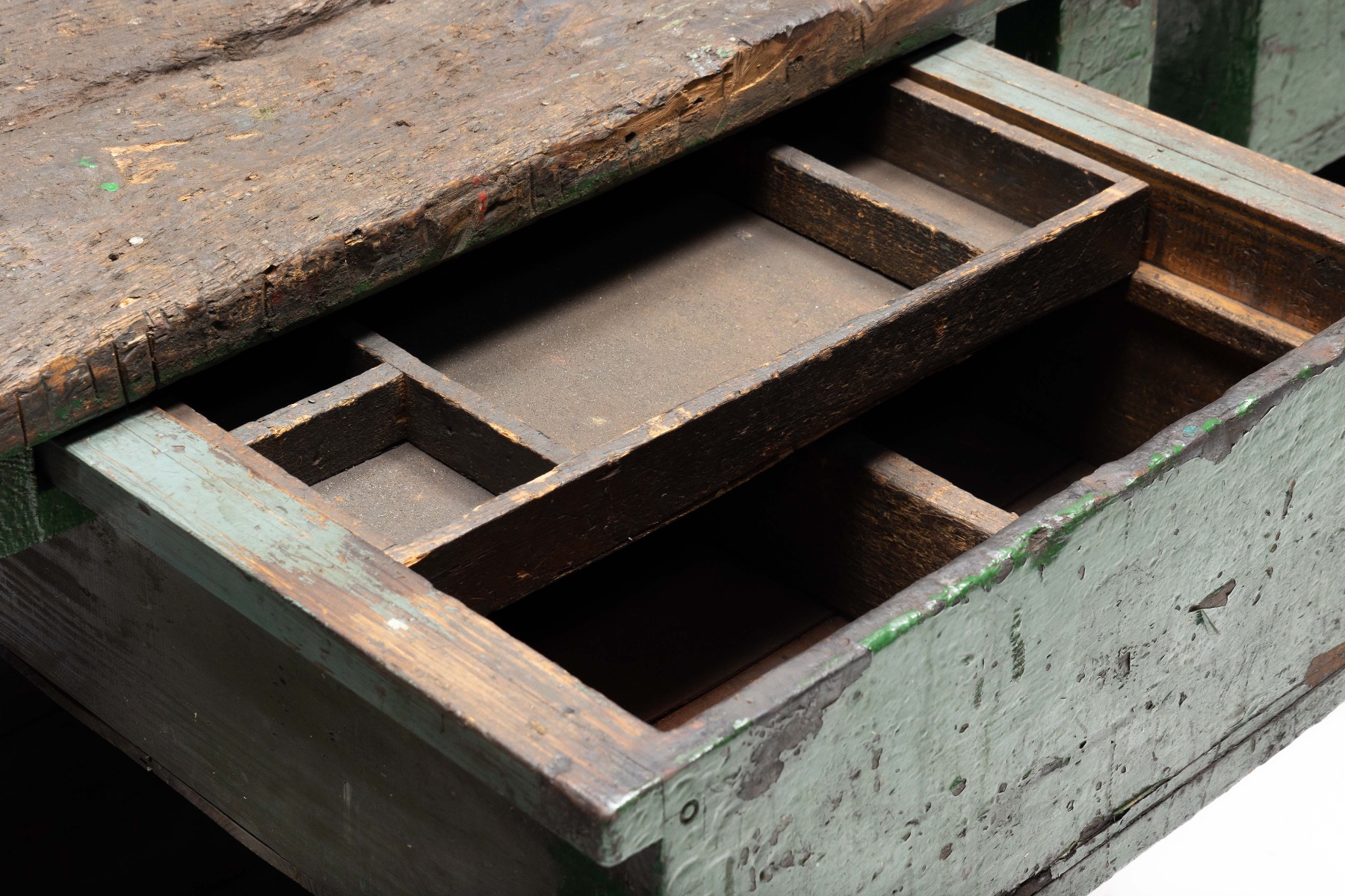 Utilitarian wooden workbench with industrial function
