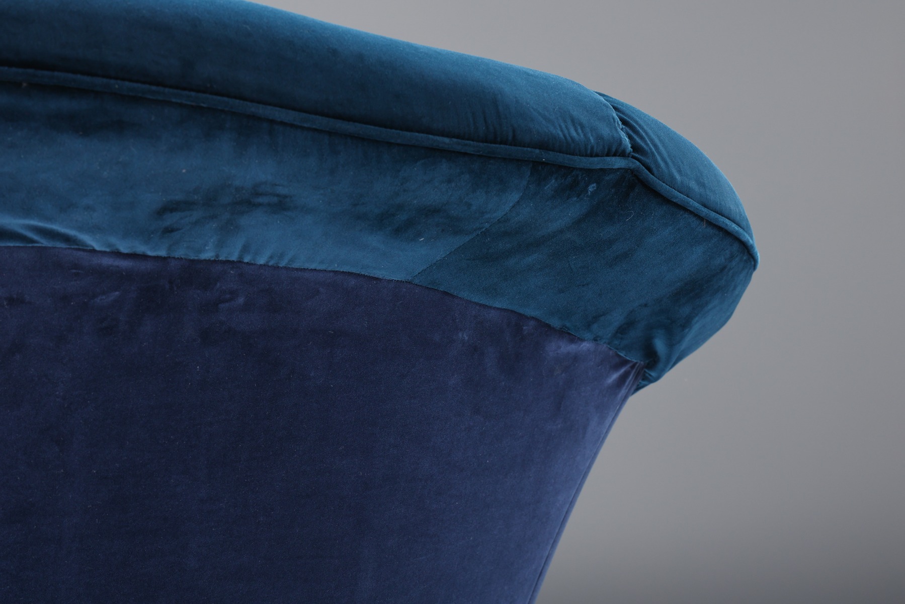Museum level curved velvet Hollywood Regency sofa
