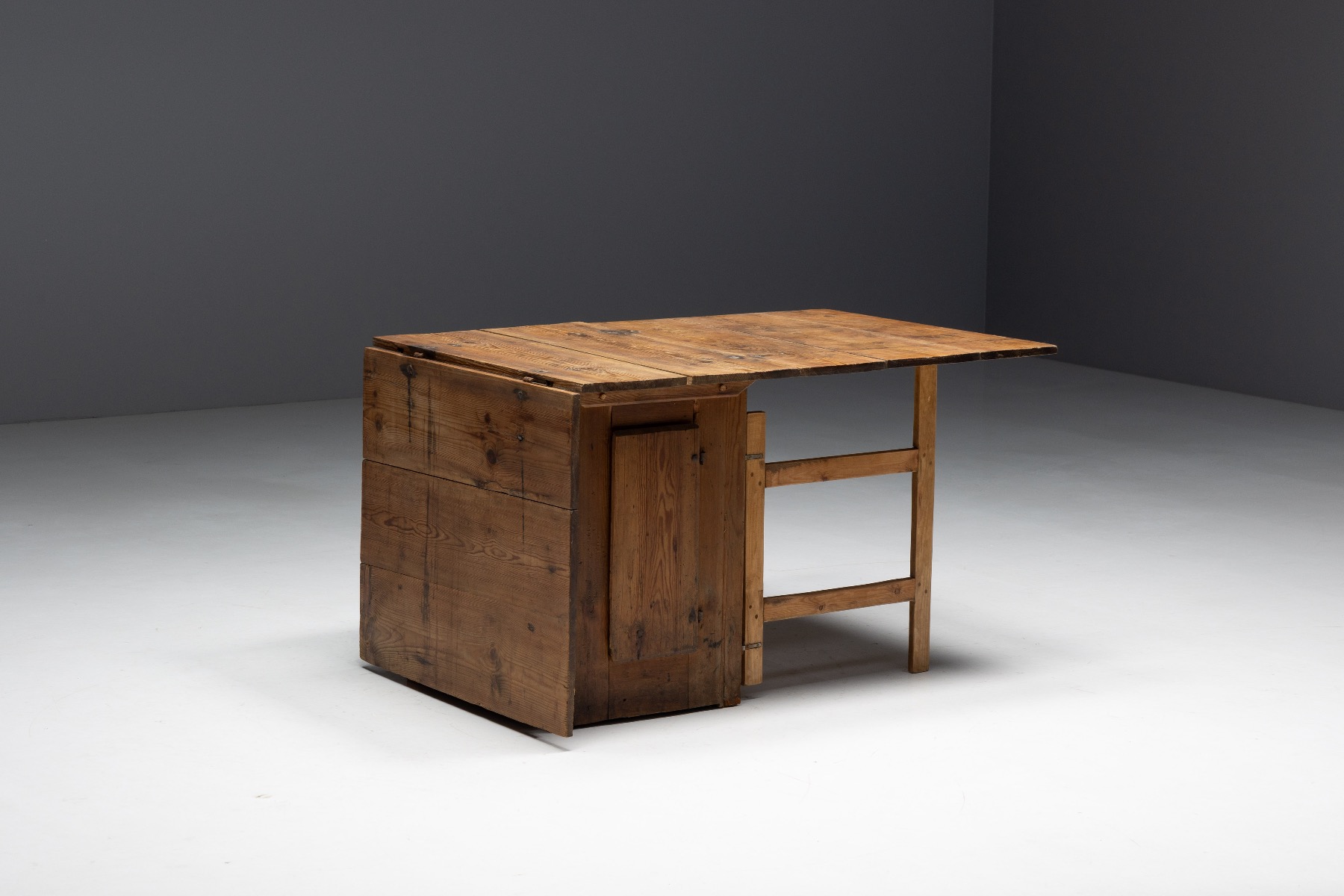 Patinated rustic drop leaf worktable with authentic wear