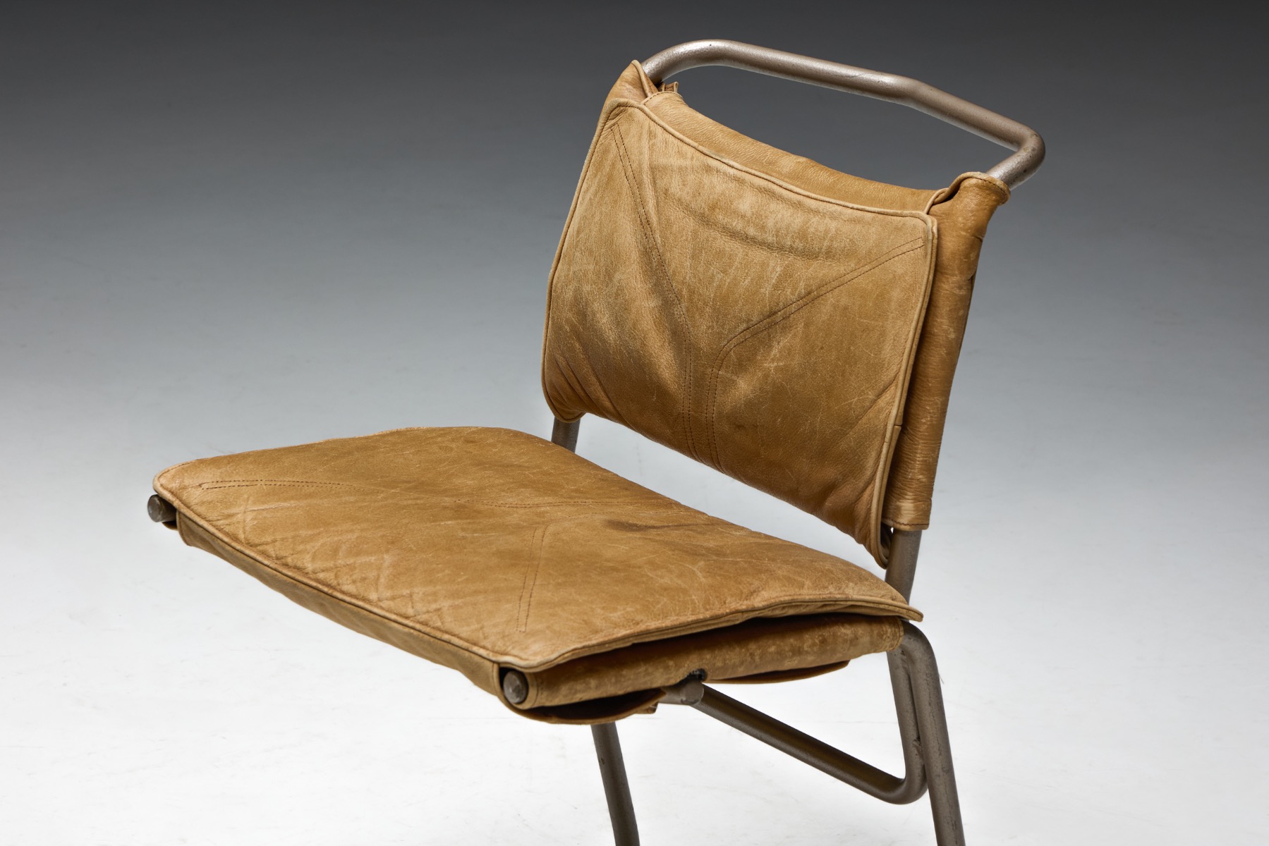 European modernist dining chairs with leather and steel