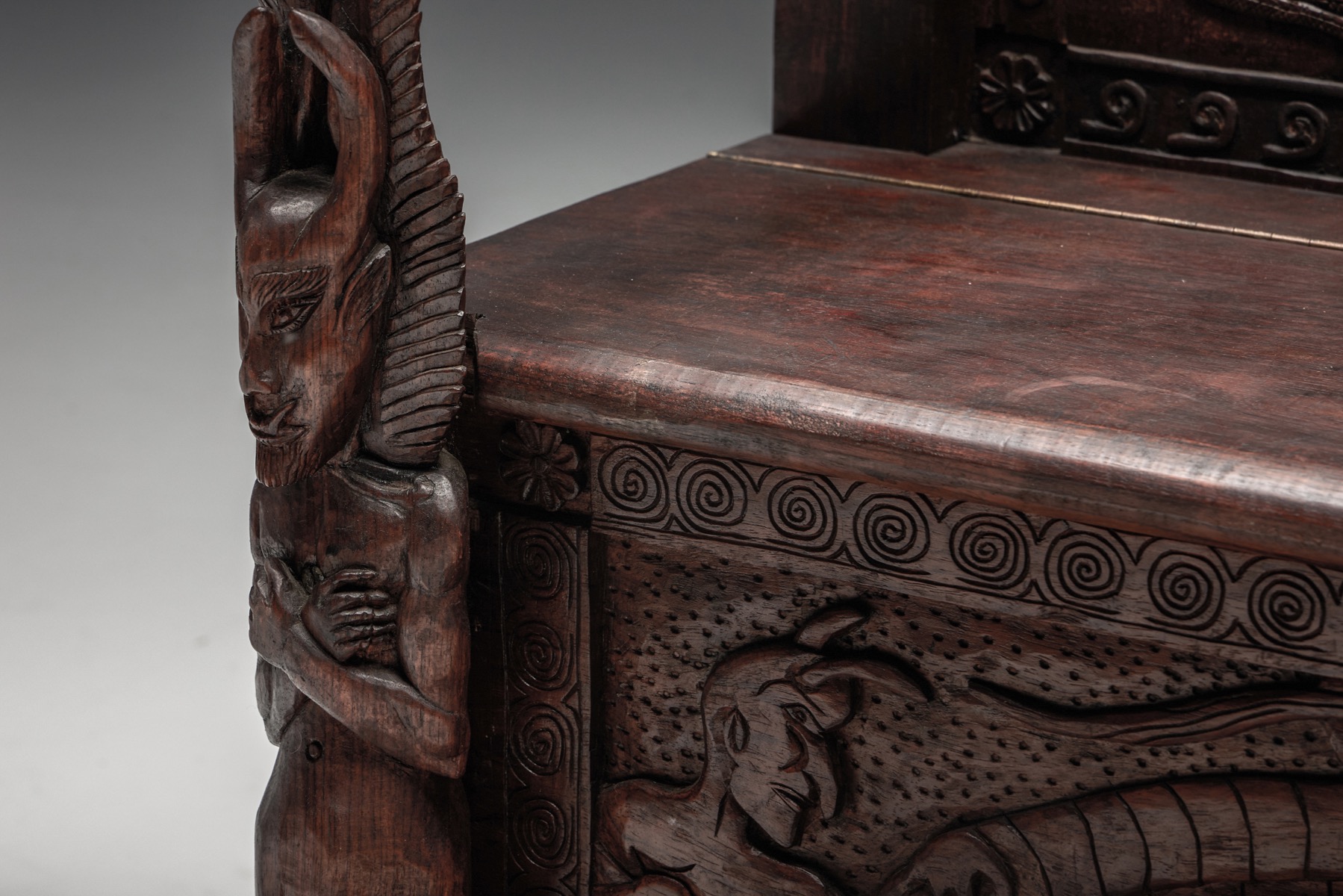Handmade throne chair in carved wood with relief
