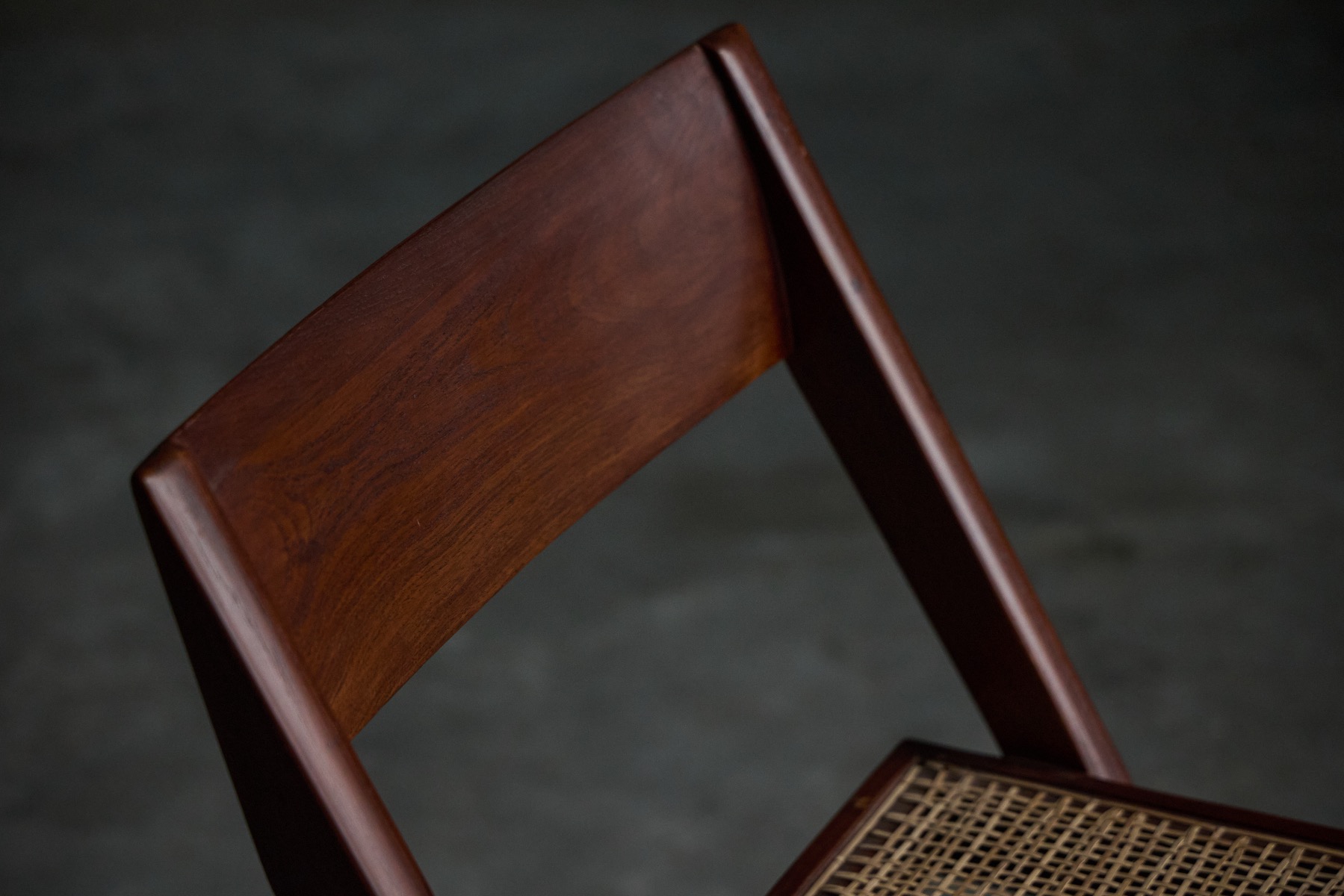 Library chair with angular wooden legs by Pierre Jeanneret