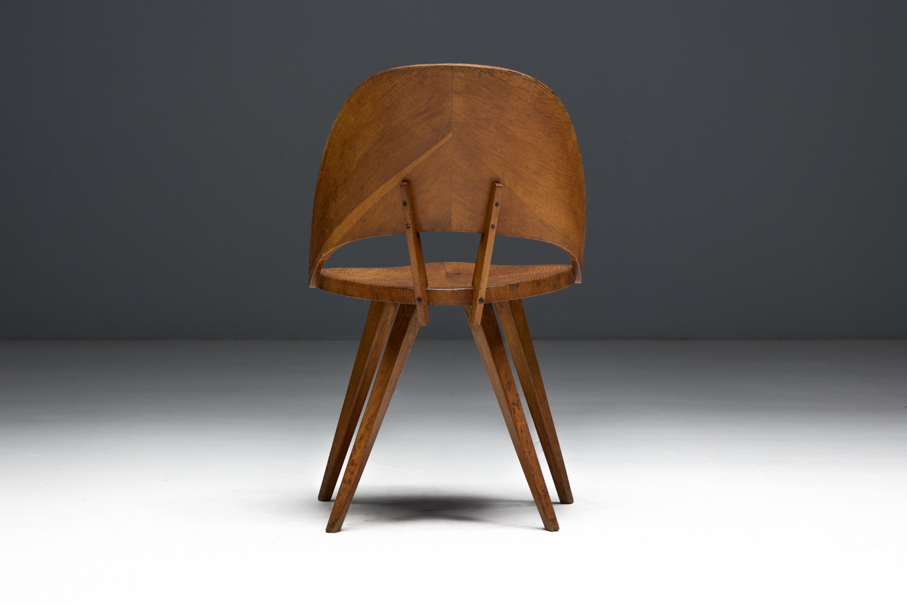 Museum level Italian plywood dining chairs from the 1940s