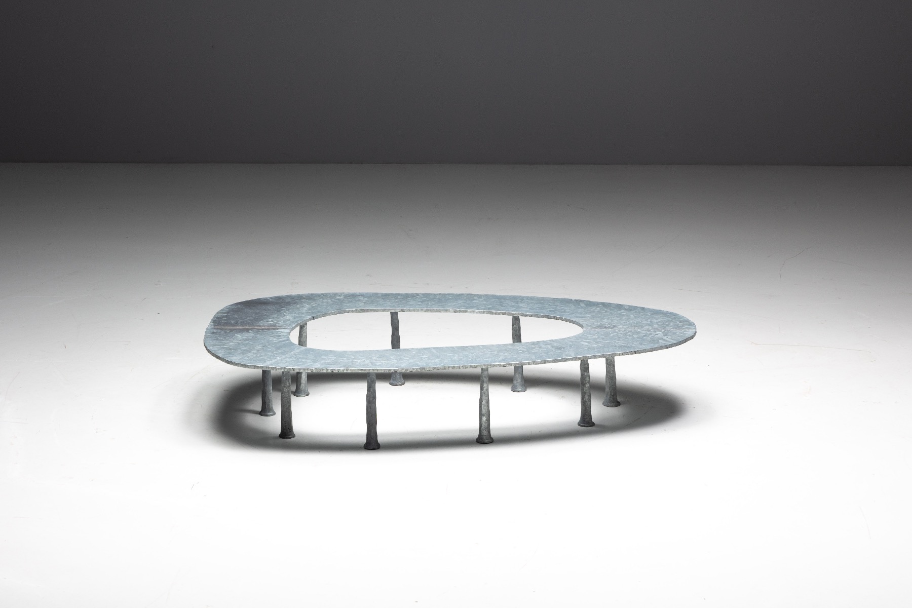 Sculpted elliptical modern center table