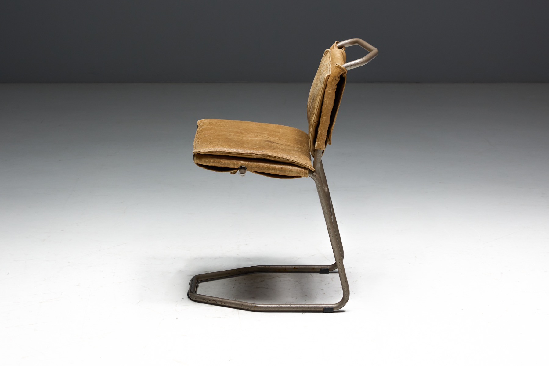 Contemporary style dining chairs in leather and steel construction