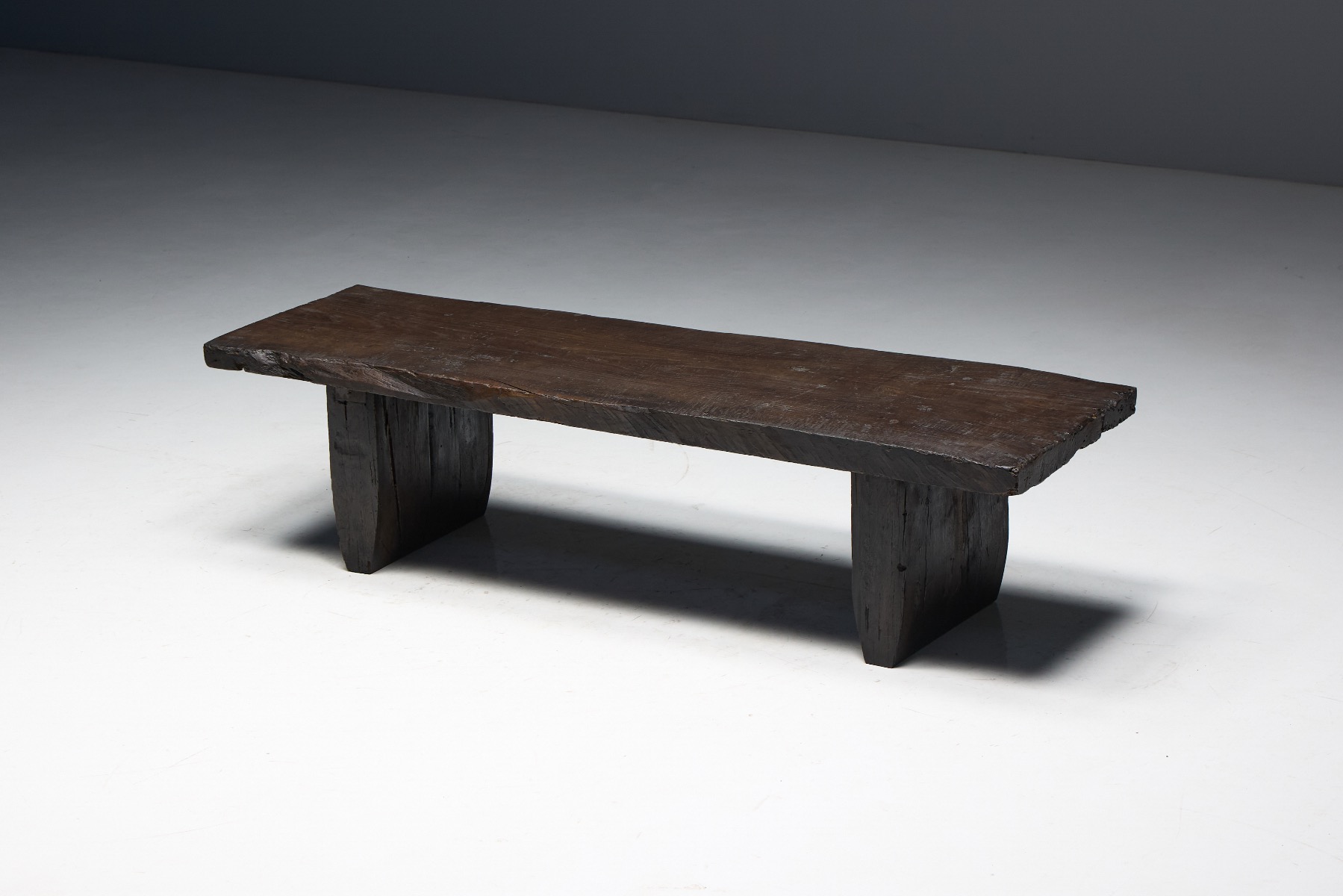Classic late 18th century rustic coffee table with brutalist form