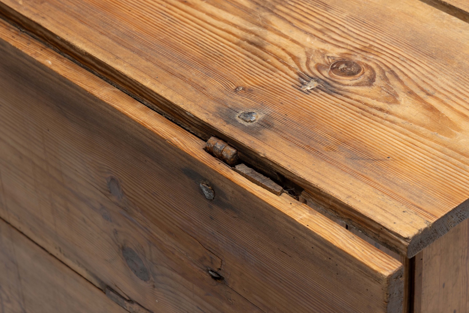 Rural worktable with hinged drop leaves and rustic finish