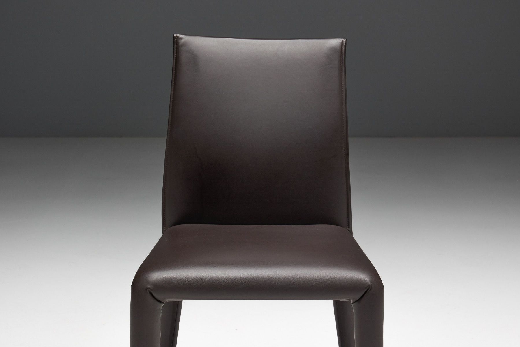 Museum level Vol Au Vent dining chairs by Mario Bellini
