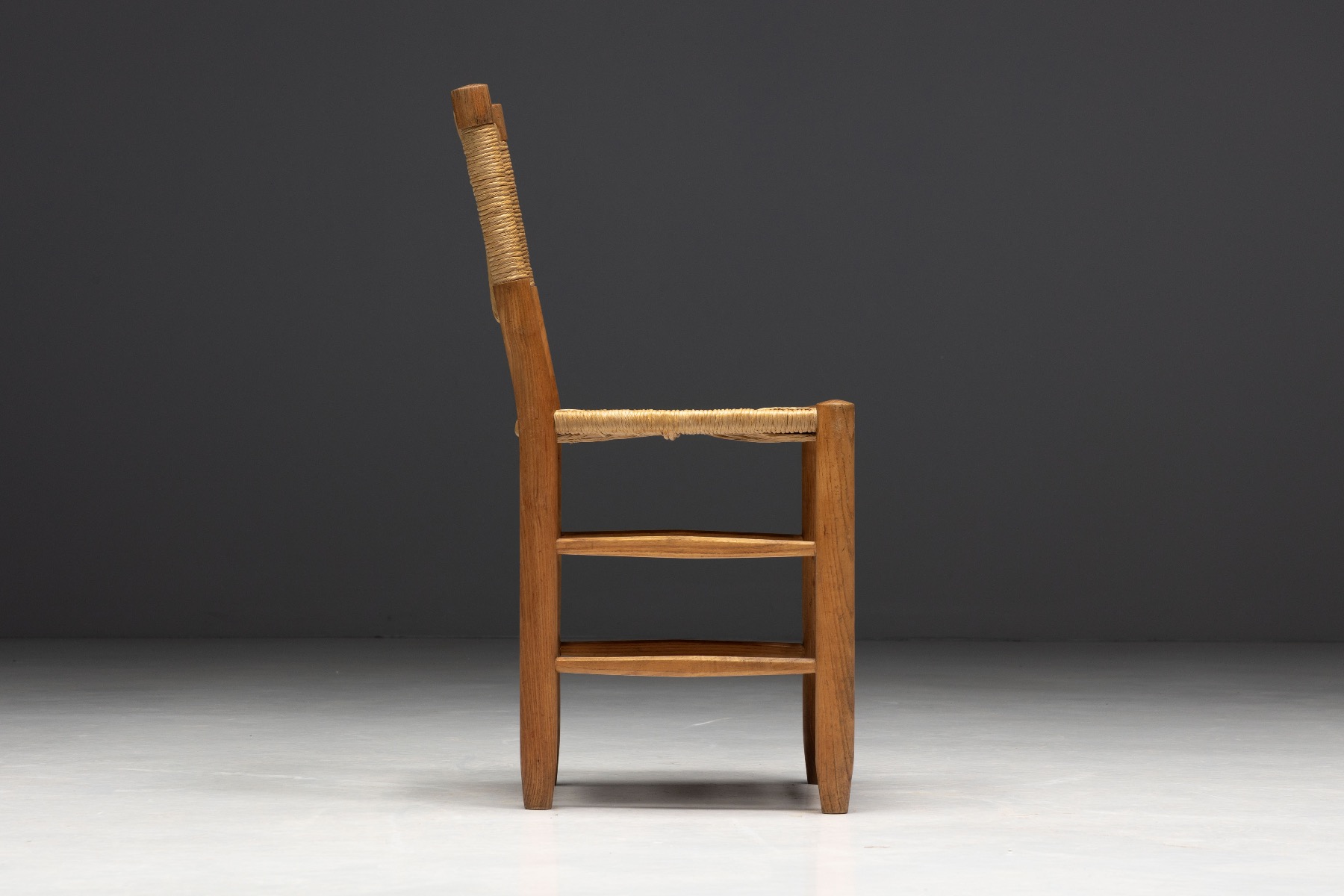 Museum level Bauche dining chairs by Charlotte Perriand