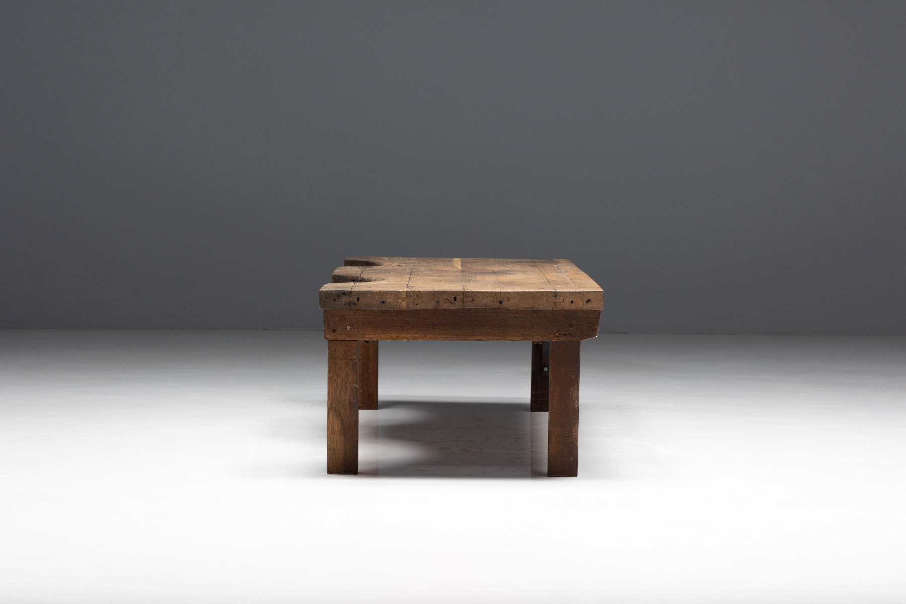 Understated historic jeweller table with honest wear