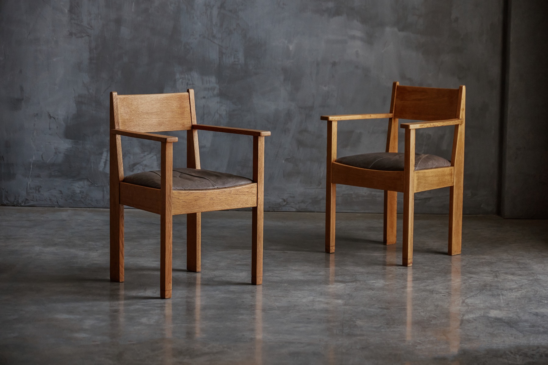Pair of 1930s oak Art Deco armchairs