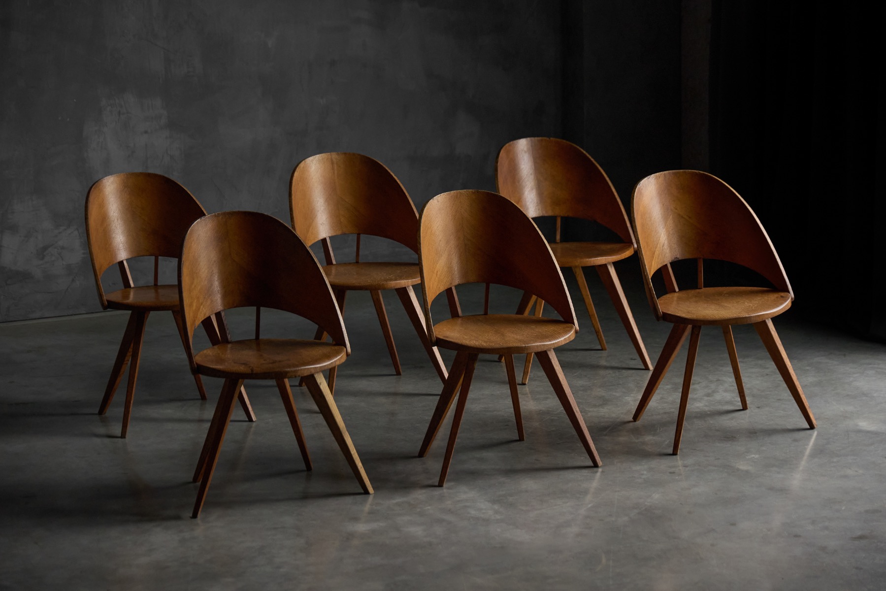 1940s Italian dining chairs crafted from molded plywood