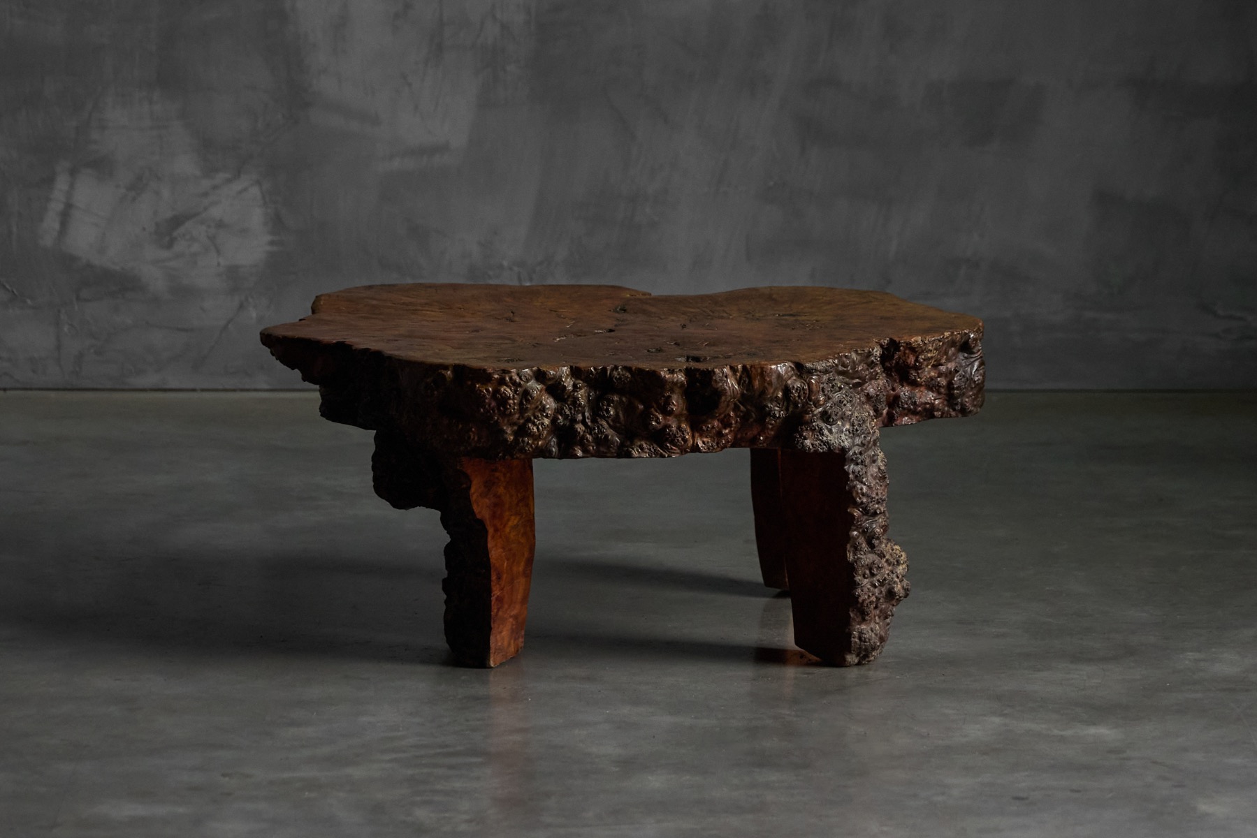 1950s organic burl wood coffee table showcasing sculptural wooden form