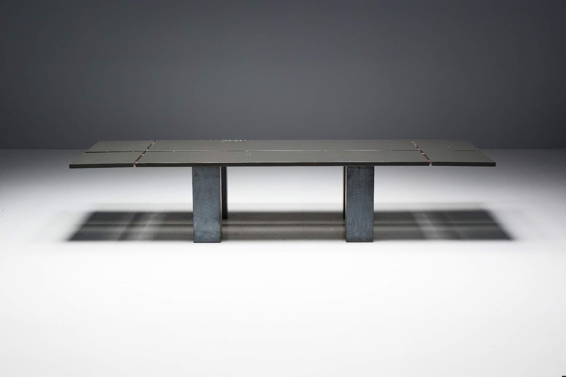 1970s brutalist dining table on stone plinth