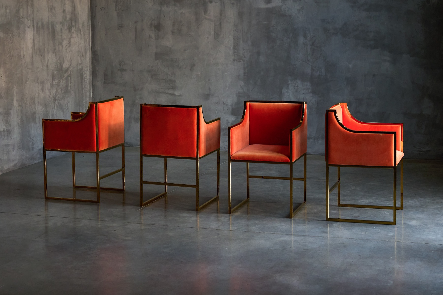 1980s brass dining armchairs upholstered in orange velvet