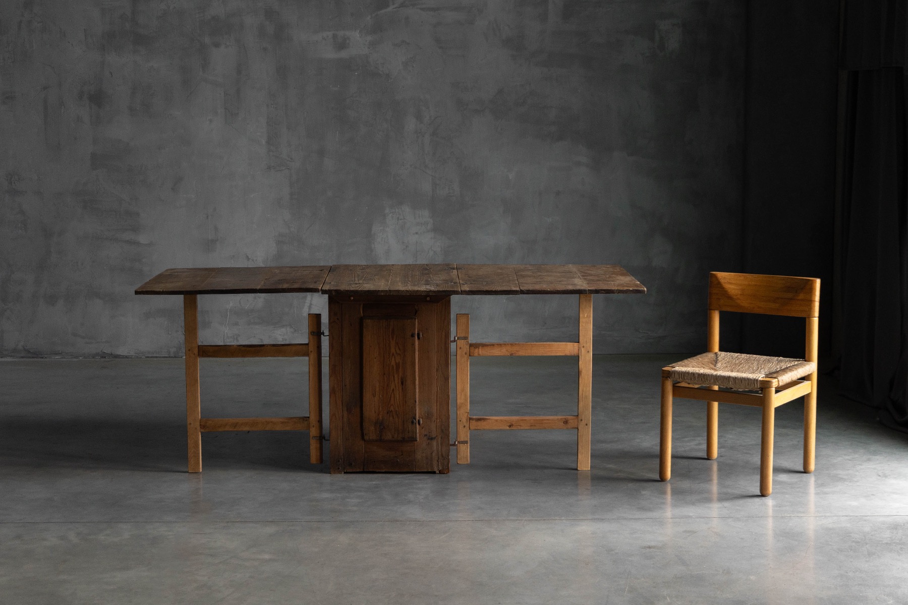 19th century rustic drop leaf worktable with utilitarian form