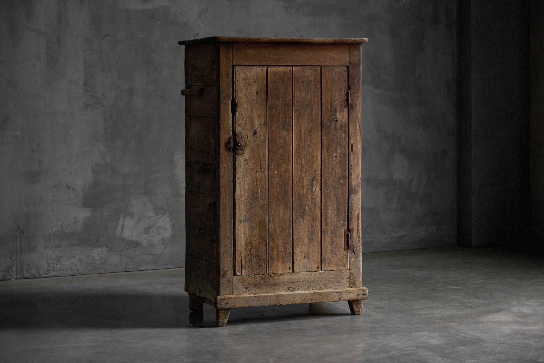 19th century rustic wooden cabinet with rural character