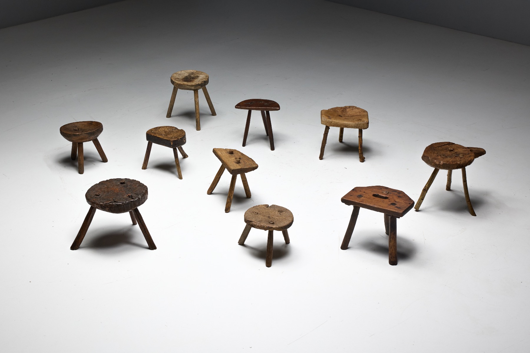 19th century vernacular wooden stools with aged patina