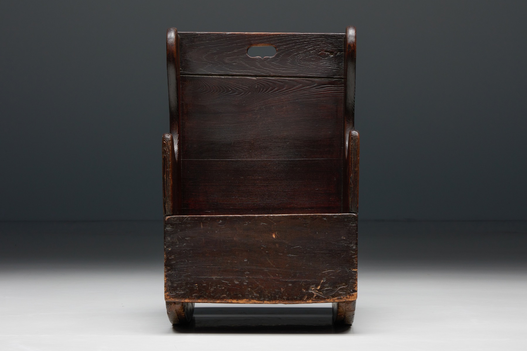 Antique children rocking chair in curved wood