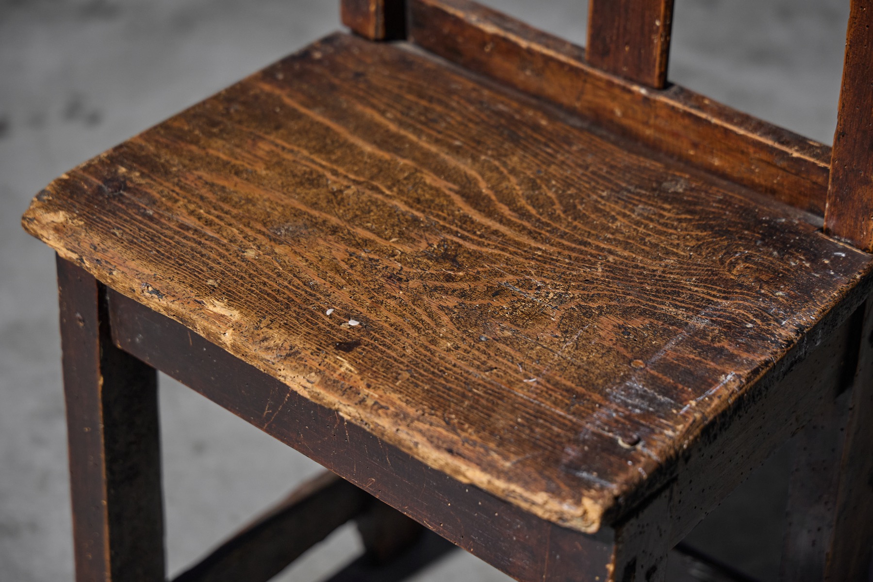 Antique wooden children’s chair with simple rural design