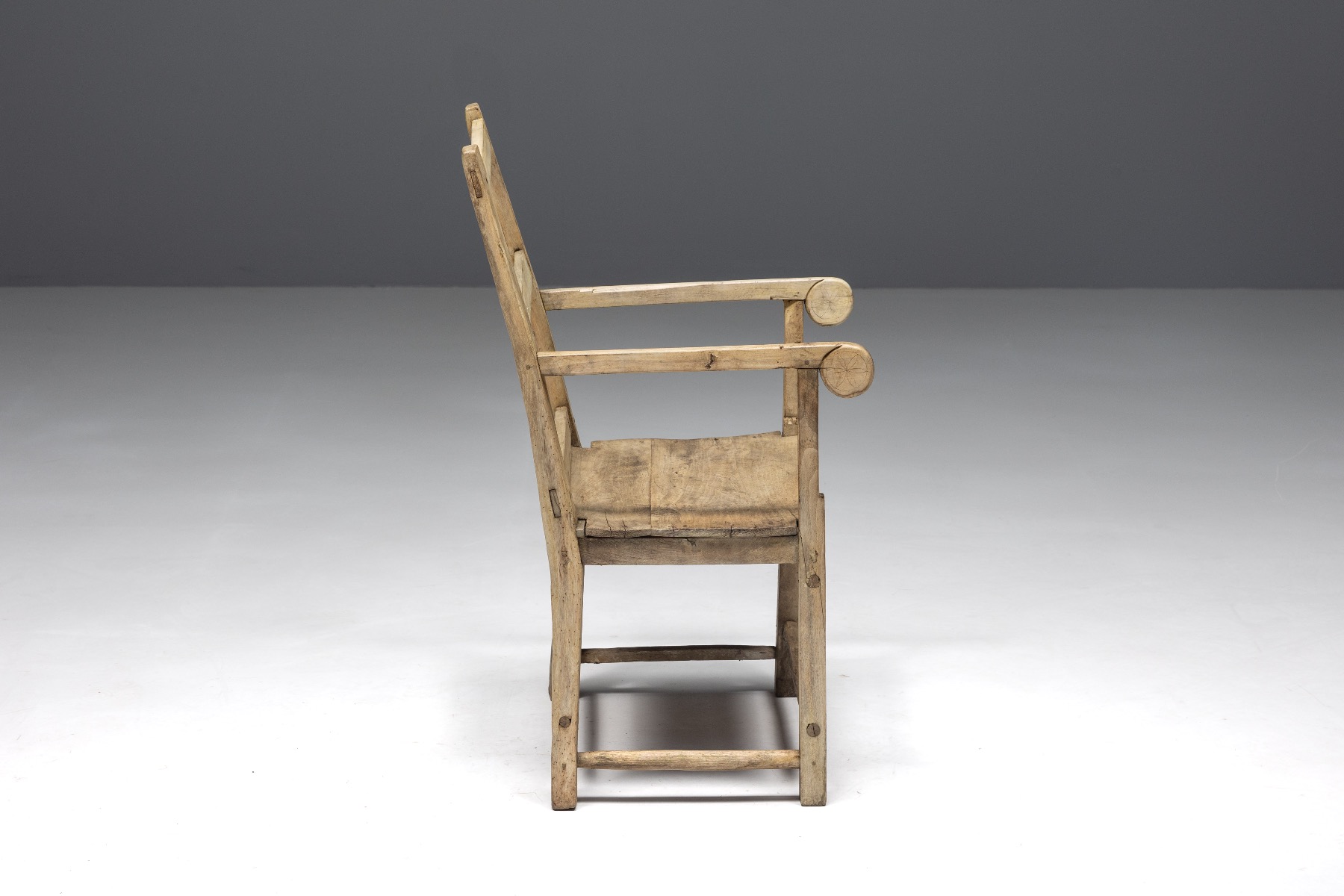 Antique French folk art armchair in solid wood