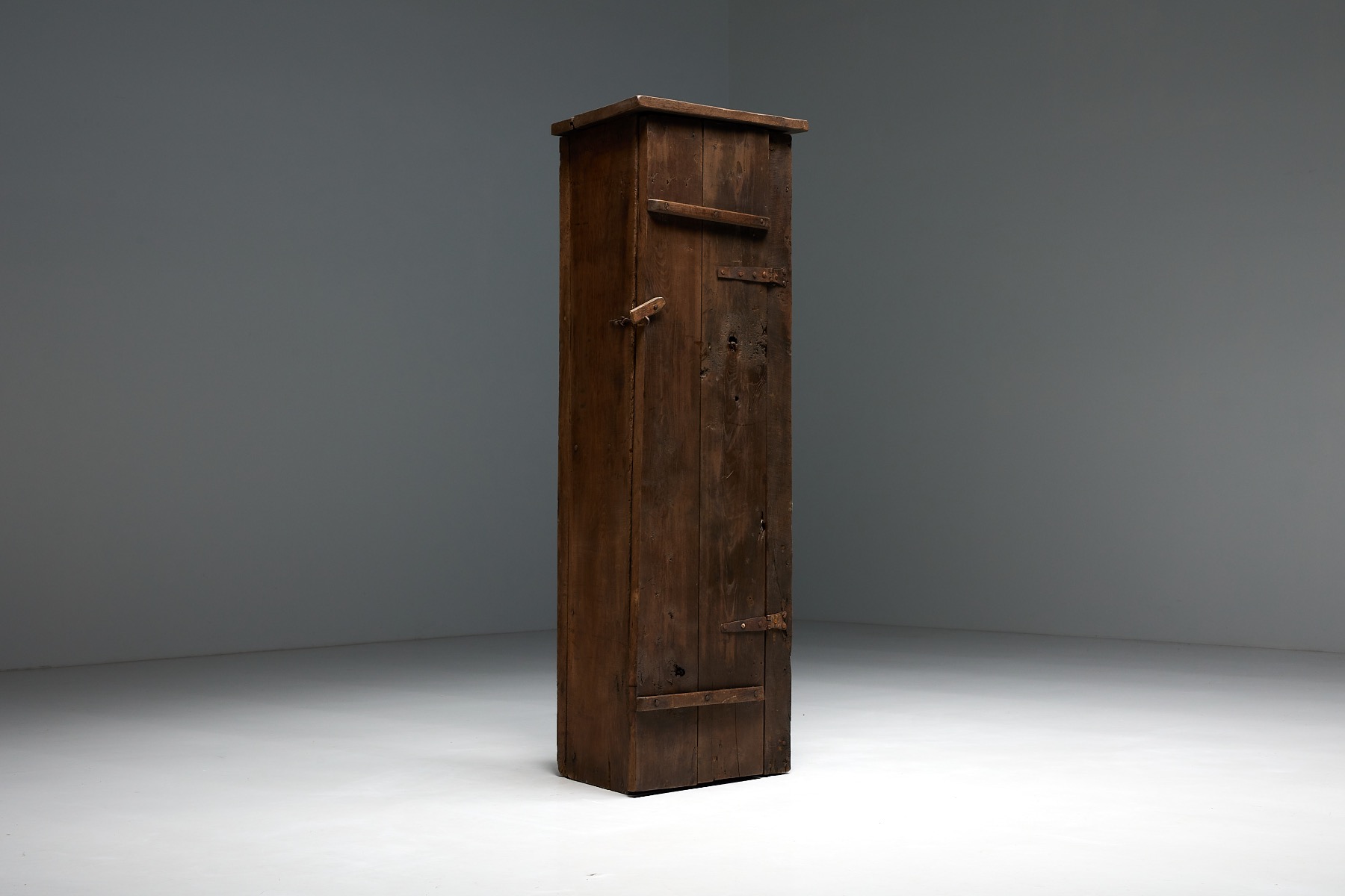 Antique French monoxylite cupboard in travail populaire style