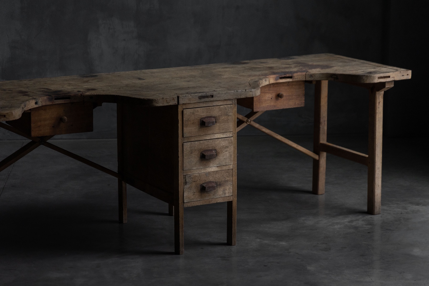 Antique wooden jewelry workbench with aged patina