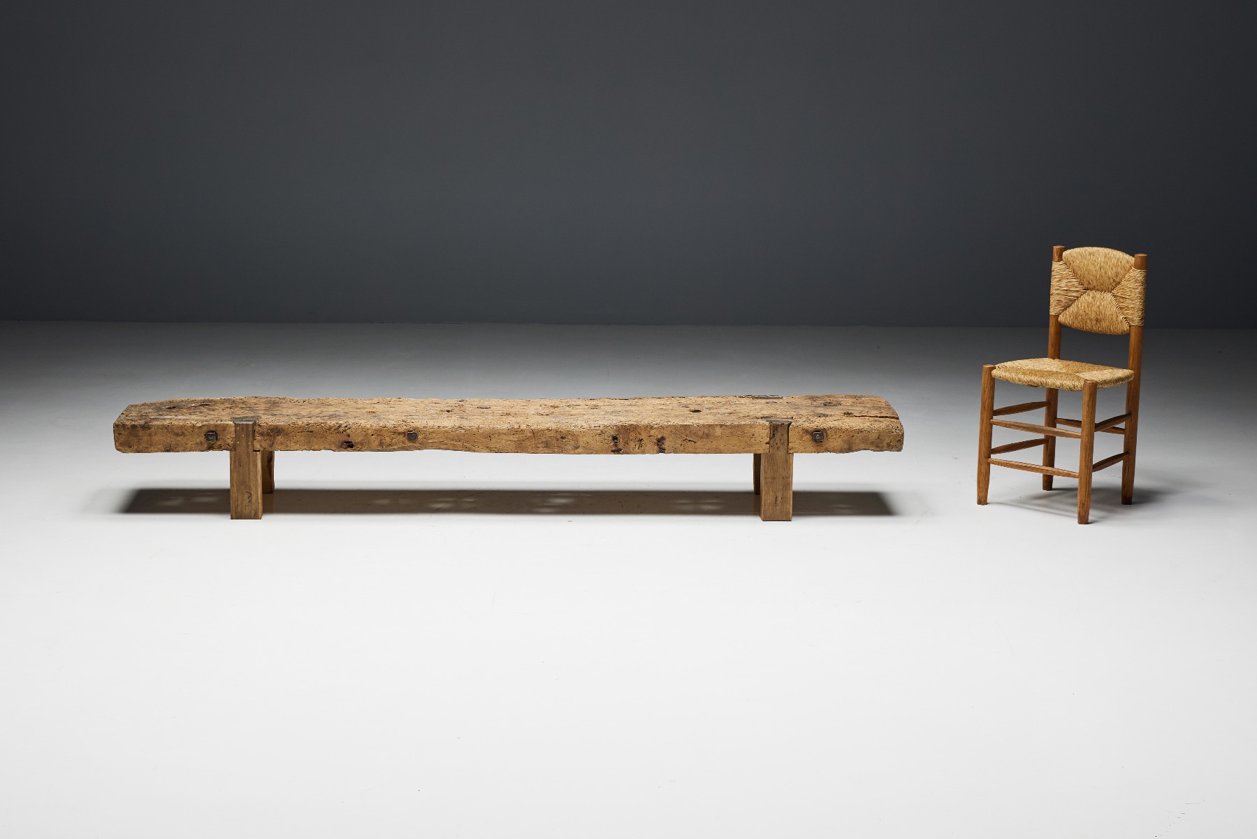 Antique rustic wooden bench in wabi sabi style