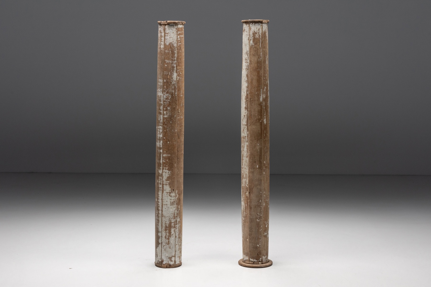 Antique wooden columns with patinated surface
